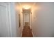 Hallway features hardwood flooring and neutral paint with white trim at 127 Marona Ne St, Atlanta, GA 30307