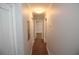 Bright hallway with modern lighting, gray walls, and hardwood floors at 127 Marona Ne St, Atlanta, GA 30307