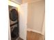 This laundry area includes a modern stacked washer and dryer at 127 Marona Ne St, Atlanta, GA 30307