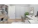 This home office is staged with a white desk and bookshelf at 127 Marona Ne St, Atlanta, GA 30307