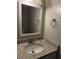Bright bathroom features white vanity, granite countertop, and modern fixtures at 641 Spring Forest Dr, Lawrenceville, GA 30043