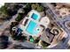 Overhead view of community pool and splashpad near ample parking, with a slide and various features at 105 Kinross Ct, Roswell, GA 30076