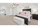 Bedroom with dark wooden furniture and neutral decor at 105 Kinross Ct, Roswell, GA 30076