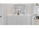 Elegant bathroom with double vanity, white countertops, and modern finishes at 484 Hammons Way, Atlanta, GA 30315