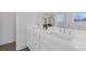 Bright bathroom with double vanity, white countertops, and elegant fixtures at 484 Hammons Way, Atlanta, GA 30315