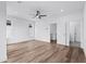 Bright bedroom boasts hardwood floors, recessed lighting, and a ceiling fan at 484 Hammons Way, Atlanta, GA 30315