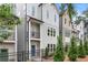 Charming new construction townhomes with modern designs, attractive facades, and small landscaped yards at 484 Hammons Way, Atlanta, GA 30315