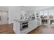 Modern kitchen showcasing stainless steel appliances, a sleek island, and ample counter space at 484 Hammons Way, Atlanta, GA 30315