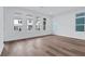 Bright living room with hardwood floors and large windows offering natural light at 484 Hammons Way, Atlanta, GA 30315
