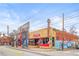 Colorful pizza restaurant featuring vintage signs and street art at 484 Hammons Way, Atlanta, GA 30315