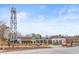 Picturesque street with the iconic B tower and local businesses at 484 Hammons Way, Atlanta, GA 30315