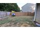 Fenced backyard with a small dog house at 637 Outlook Way, Atlanta, GA 30349