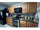 Functional kitchen featuring modern appliances, ample cabinet space, and granite countertops at 637 Outlook Way, Atlanta, GA 30349