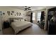 Bright bedroom with ceiling fan, comfortable bed, and plenty of natural light at 637 Outlook Way, Atlanta, GA 30349