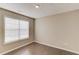 Bedroom with hardwood floors and natural light from a large window at 2094 Green Gate Pl, Grayson, GA 30017