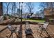 Charming backyard seating area featuring a fire pit, perfect for relaxing evenings at 4172 Westchester Ne Xing, Roswell, GA 30075