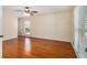 Bright bedroom featuring hardwood floors, natural light, and neutral paint, creating a calming space at 459 Rabbit Run, Mcdonough, GA 30252