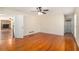 Bedroom with hardwood floors, an overhead fan and easy access to an en-suite bathroom at 459 Rabbit Run, Mcdonough, GA 30252