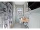 Bathroom featuring a blue tile shower and walls, with vintage colored fixtures at 1141 Milstead Ne Ave, Conyers, GA 30012