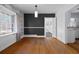 Bright dining room featuring hardwood floors, window, and built-in shelving at 1141 Milstead Ne Ave, Conyers, GA 30012