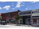 Street view of commercial buildings in Villa Rica featuring small businesses and unique architectural details at 206 Gillis Sw Way, Villa Rica, GA 30180