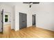 Bedroom showcasing hardwood floors and a closet with bi-fold doors at 244 Locust Ne St # B, Atlanta, GA 30317