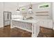 Lovely kitchen with white cabinetry, stainless steel appliances, and a central island at 244 Locust Ne St # B, Atlanta, GA 30317