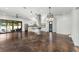 Spacious living room featuring polished concrete floors, a ceiling fan, and an open floor plan at 244 Locust Ne St # B, Atlanta, GA 30317