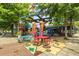 Vibrant outdoor patio with colorful seating and playful murals, a welcoming space for dining at 244 Locust Ne St # B, Atlanta, GA 30317