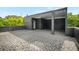 Modern rooftop deck features a herringbone-patterned brick floor with a partial covering and outdoor access to the home at 244 Locust Ne St # B, Atlanta, GA 30317