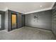 Covered rooftop deck with herringbone brick flooring, ceiling fan and lighting for outdoor living and entertainment at 244 Locust Ne St # B, Atlanta, GA 30317