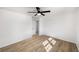 Bright, airy bedroom with wood floors, closet, and a ceiling fan at 3001 W Potomac Dr, Atlanta, GA 30344