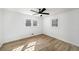 Bright, airy bedroom with wood floors and a ceiling fan at 3001 W Potomac Dr, Atlanta, GA 30344