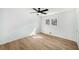 Bright, airy bedroom with wood floors and a ceiling fan at 3001 W Potomac Dr, Atlanta, GA 30344