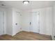 Entryway with wood floors and three white doors at 3001 W Potomac Dr, Atlanta, GA 30344