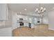 Modern kitchen with stainless steel appliances and hardwood flooring at 654 Egrets Lot 65 Lndg, Covington, GA 30014