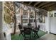 Private outdoor patio featuring a dining set and enclosed by a charming white picket fence at 951 Glenwood Se Ave # 704, Atlanta, GA 30316