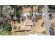 Aerial view of a home with a private driveway and lush, landscaped yard at 3401 Lori Ln, Atlanta, GA 30340