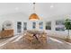 Bright dining room with natural lighting and decorative light fixture at 3401 Lori Ln, Atlanta, GA 30340