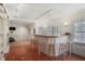 Charming bar area with hardwood floors, pendant lighting, and bar stool seating at 1835 Berkeley Ne Mews, Atlanta, GA 30329