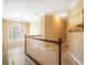 Upstairs hallway with carpet, cream-colored walls, and decorative lighting at 1835 Berkeley Ne Mews, Atlanta, GA 30329