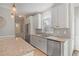 Bright kitchen featuring white cabinets, stainless steel appliances and granite countertops at 1835 Berkeley Ne Mews, Atlanta, GA 30329