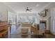 Cozy living room with fireplace, dark wood floors, light-colored walls, and bright sunlight at 1835 Berkeley Ne Mews, Atlanta, GA 30329