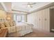 Spacious main bedroom with built-in cabinets, trey ceilings, and neutral tones at 1835 Berkeley Ne Mews, Atlanta, GA 30329