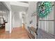 Welcoming foyer with hardwood floors and a view into the dining room at 2230 Rosemoore Walk, Marietta, GA 30062