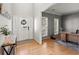 Bright foyer leading to an office space featuring hardwood floors and natural light at 2230 Rosemoore Walk, Marietta, GA 30062