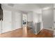 Hallway with hardwood flooring and natural light near bedrooms at 2230 Rosemoore Walk, Marietta, GA 30062