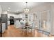 Bright kitchen features stainless steel appliances and a breakfast bar at 2230 Rosemoore Walk, Marietta, GA 30062