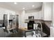 Well-equipped kitchen featuring granite countertops and stainless steel appliances at 2230 Rosemoore Walk, Marietta, GA 30062