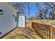 A charming wood deck overlooking the expansive backyard, perfect for outdoor relaxation at 543 Paines Nw Ave, Atlanta, GA 30318